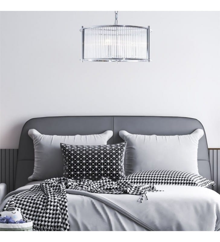 Szklana elegancka lampa wisząca Marmo nad łóżko w sypialni styl glamour